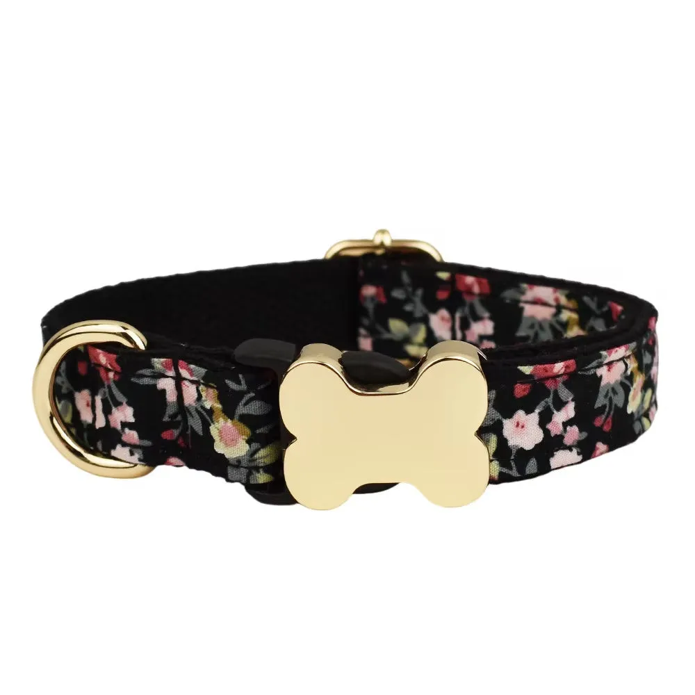 Flat nylon dog collar with a printed grid pattern and a white bone-shaped plastic buckle.