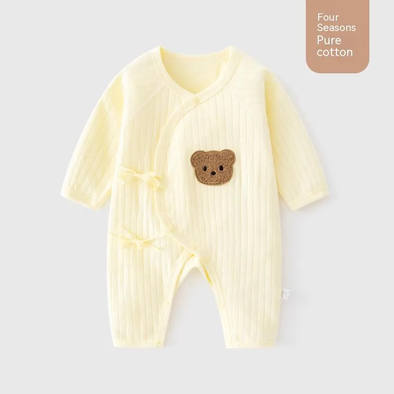 White cotton newborn jumpsuit with top fly lace closure and jacquard teddy bear straps