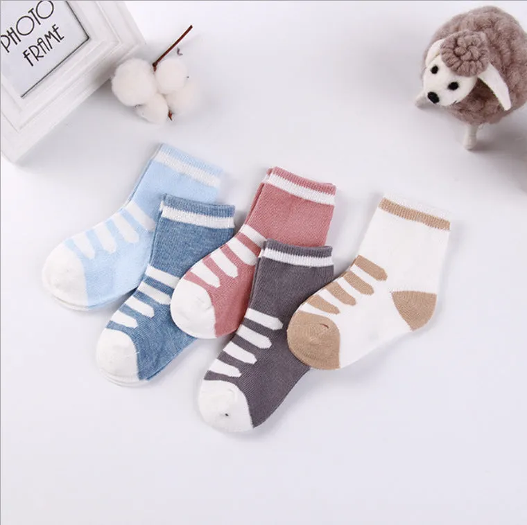 Set of five children's cotton socks in assorted solid colours and stripes, mid-tube length for toddlers 1-3 years