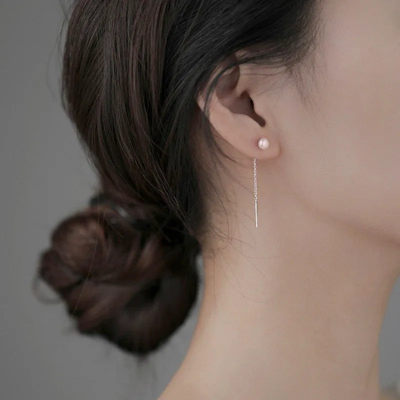 Sterling silver ear string earring with a selection of 5mm pendant charms including pearl, clay ball, and geometric shapes.