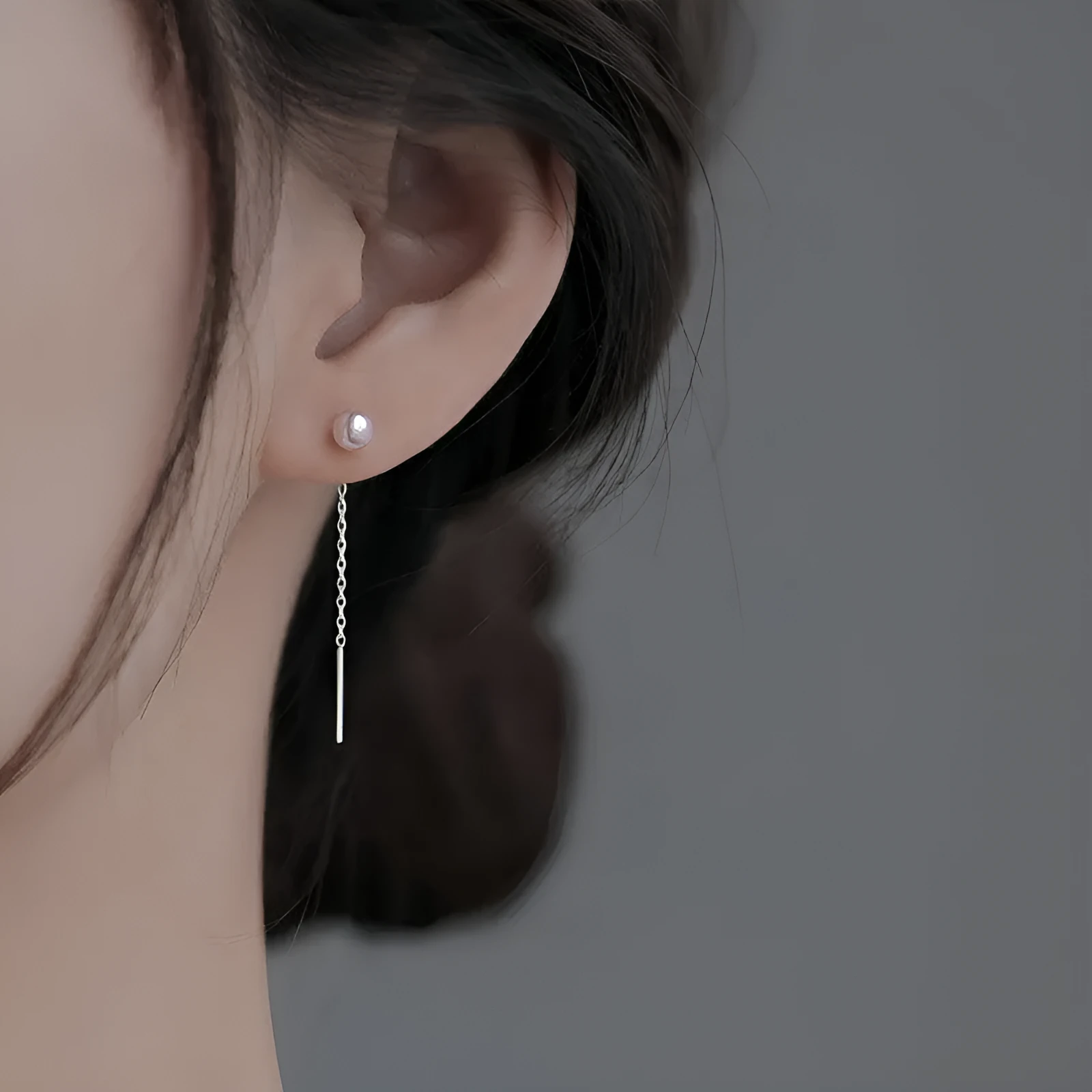 Sterling silver ear string earring with a selection of 5mm pendant charms including pearl, clay ball, and geometric shapes.