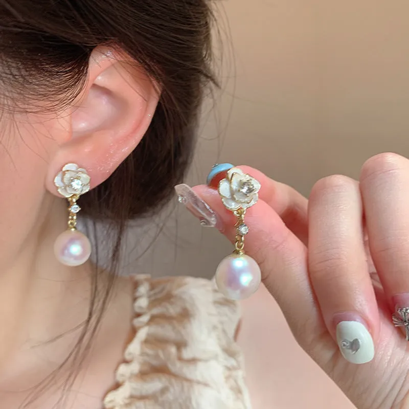 Camellia pearl flower stud earrings for women with alloy flower shape and silver-tone pearl detailing