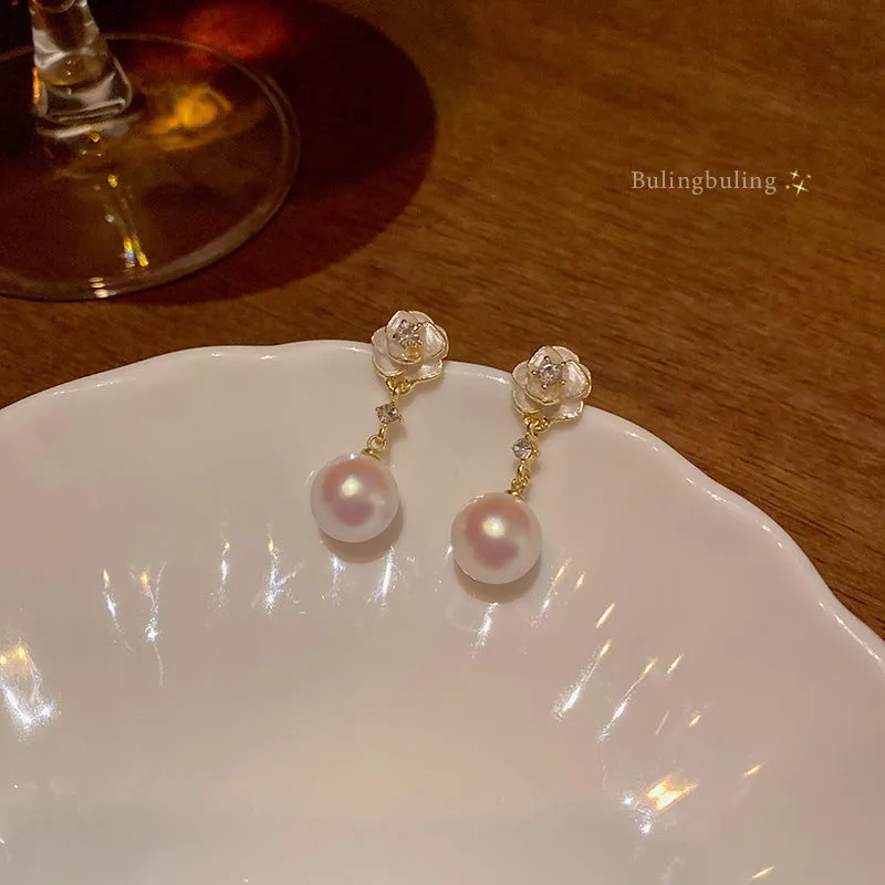 Camellia pearl flower stud earrings for women with alloy flower shape and silver-tone pearl detailing