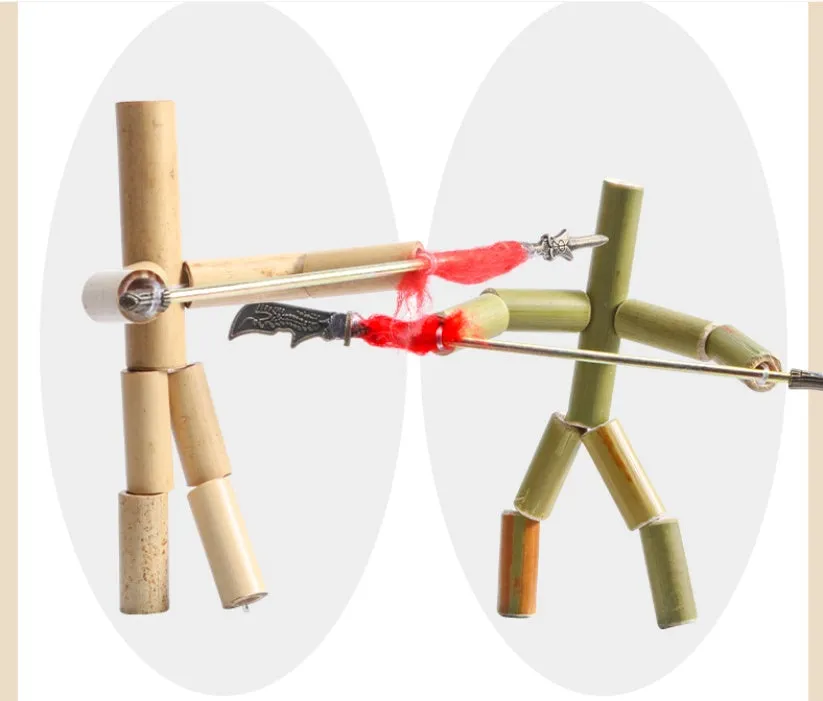 Bamboo Man children's wooden fighting game table set with two Bamboo Man figures and iron weapons in gift box