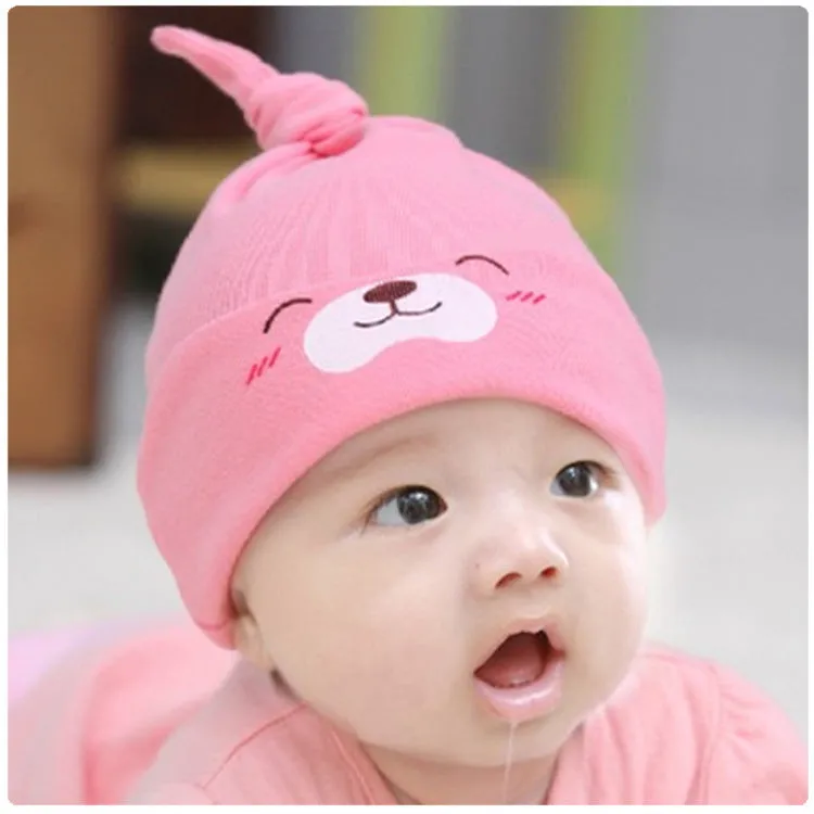 Baby soft cotton sleeping cap with cartoon bear design in blue, gold, and pink colours
