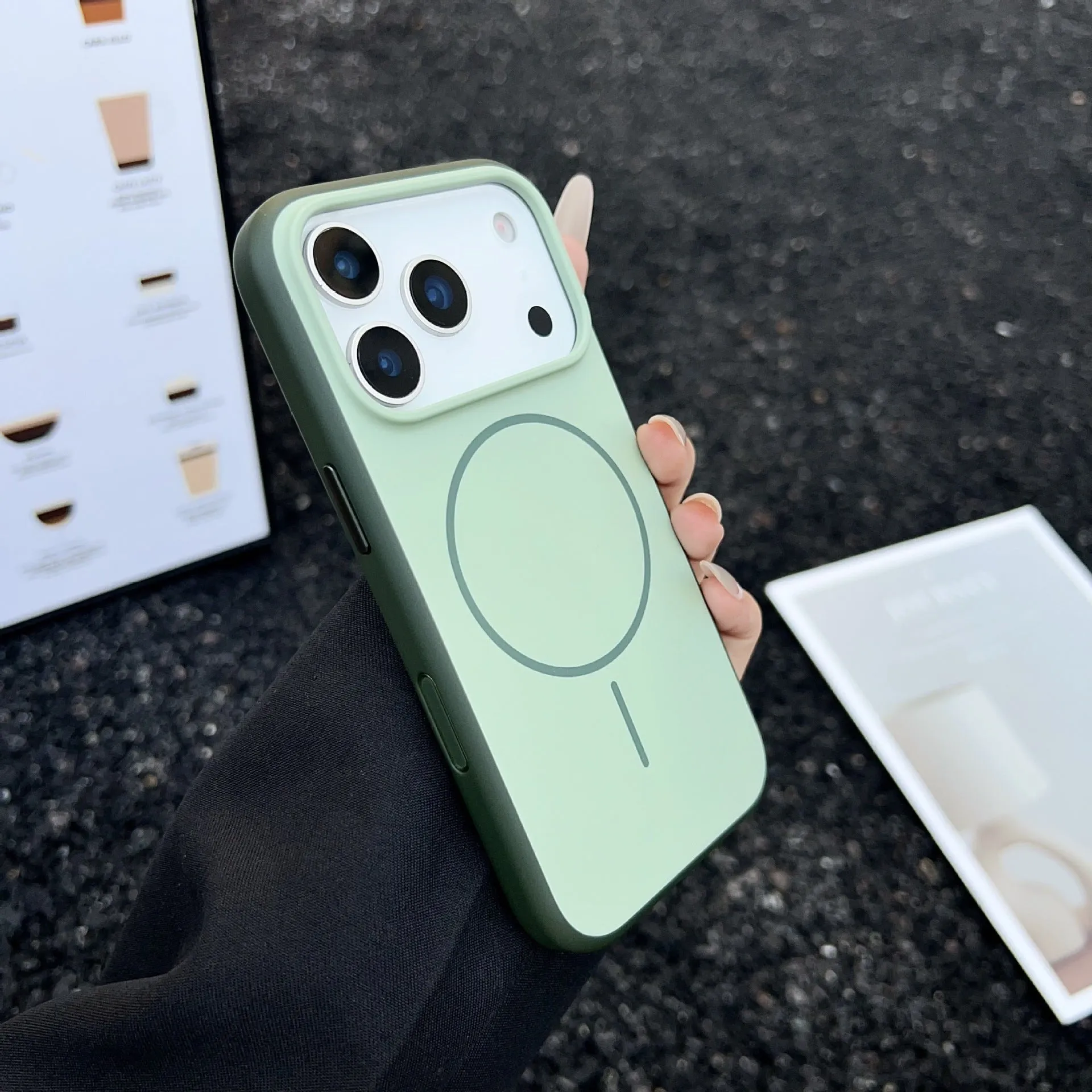 Blue magnetic iPhone 17 phone case with a dedicated AI camera button and frosted finish.