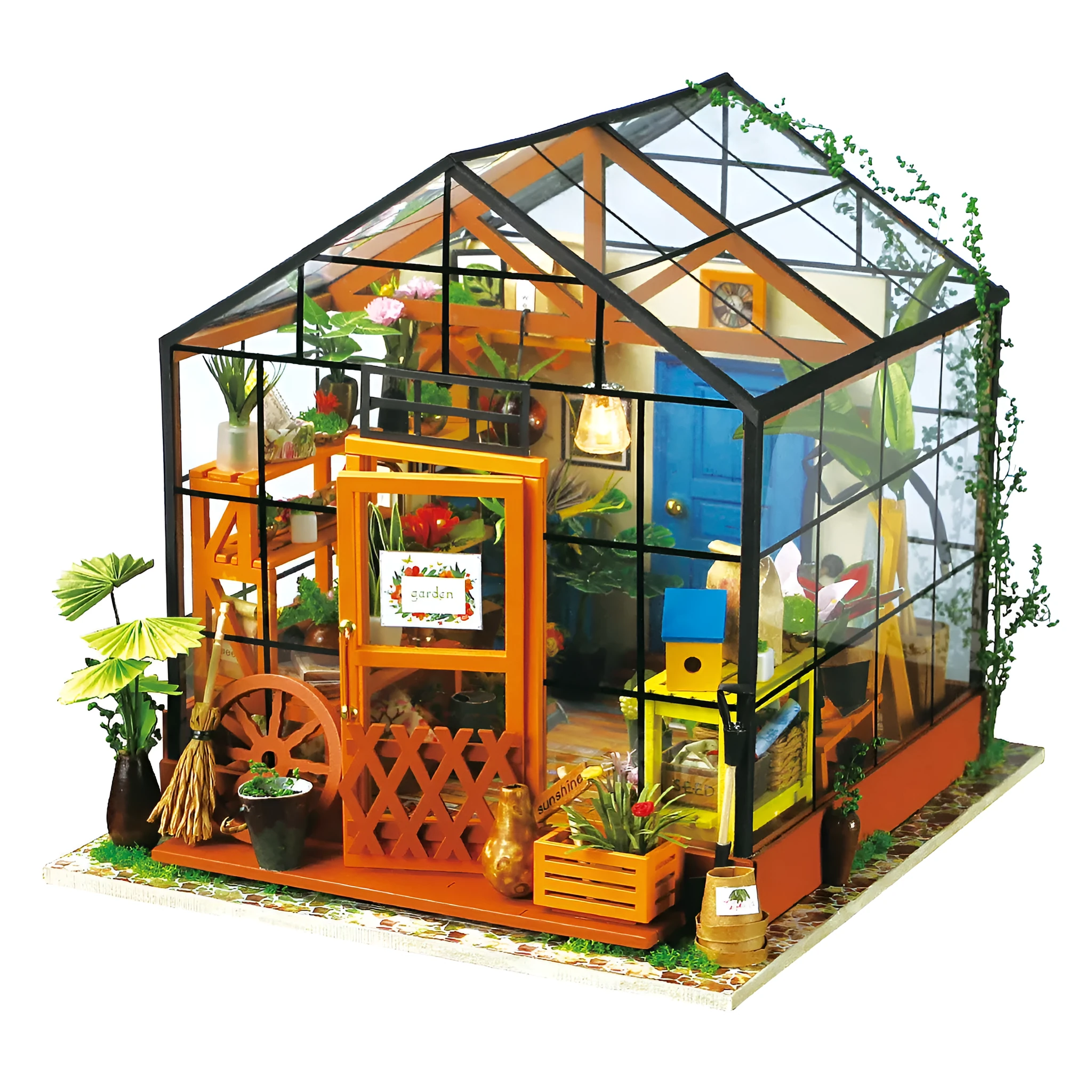 Robotime Kathy's Green Garden miniature doll house with LED light and glasshouse, finished display model on a shelf.