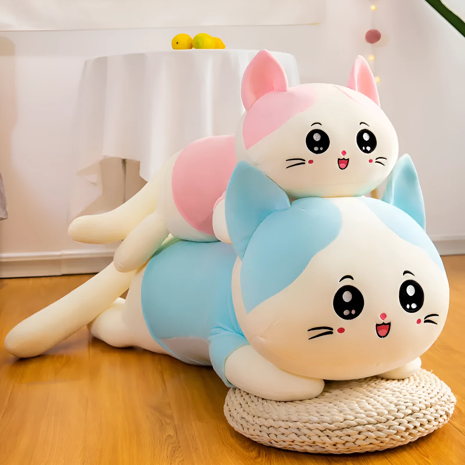 Cute cat plush toy sofa cushion in soft velvet fabric, available in blue and pink, 110cm length