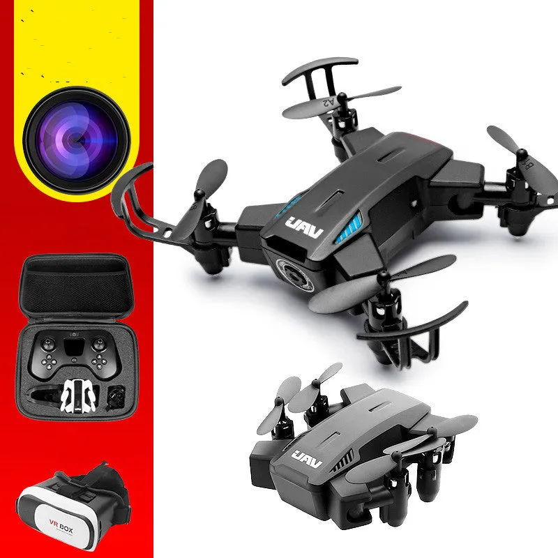 Quadcopter drone with HD 2 million pixel camera, black colour, propellers, and VR glasses on a white background