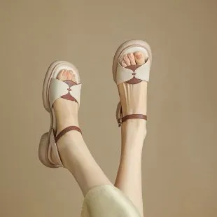 Women's beige chunky heel platform sandals with open toe and renewable leather upper.