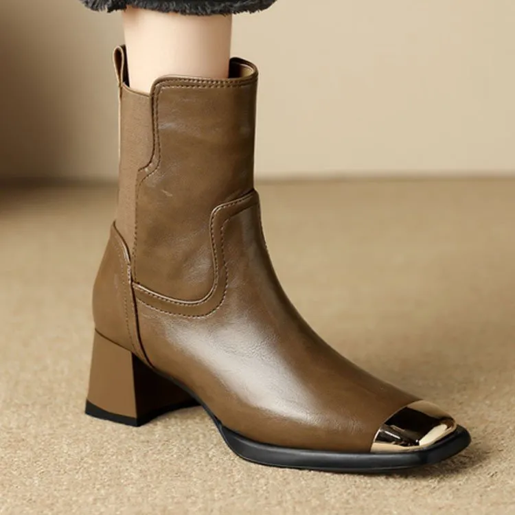 Brown high-heel Martin boots with side zipper and decorative metal rivet details.