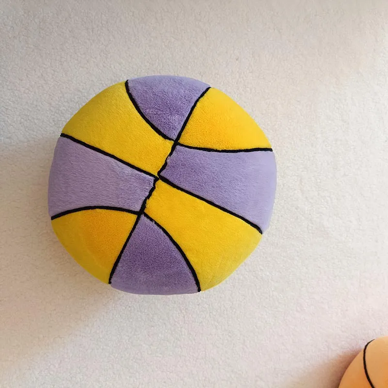 Soft spherical basketball plush toy in orange with black lines, 28cm tall, on a light background