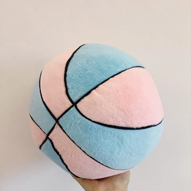 Soft spherical basketball plush toy in orange with black lines, 28cm tall, on a light background
