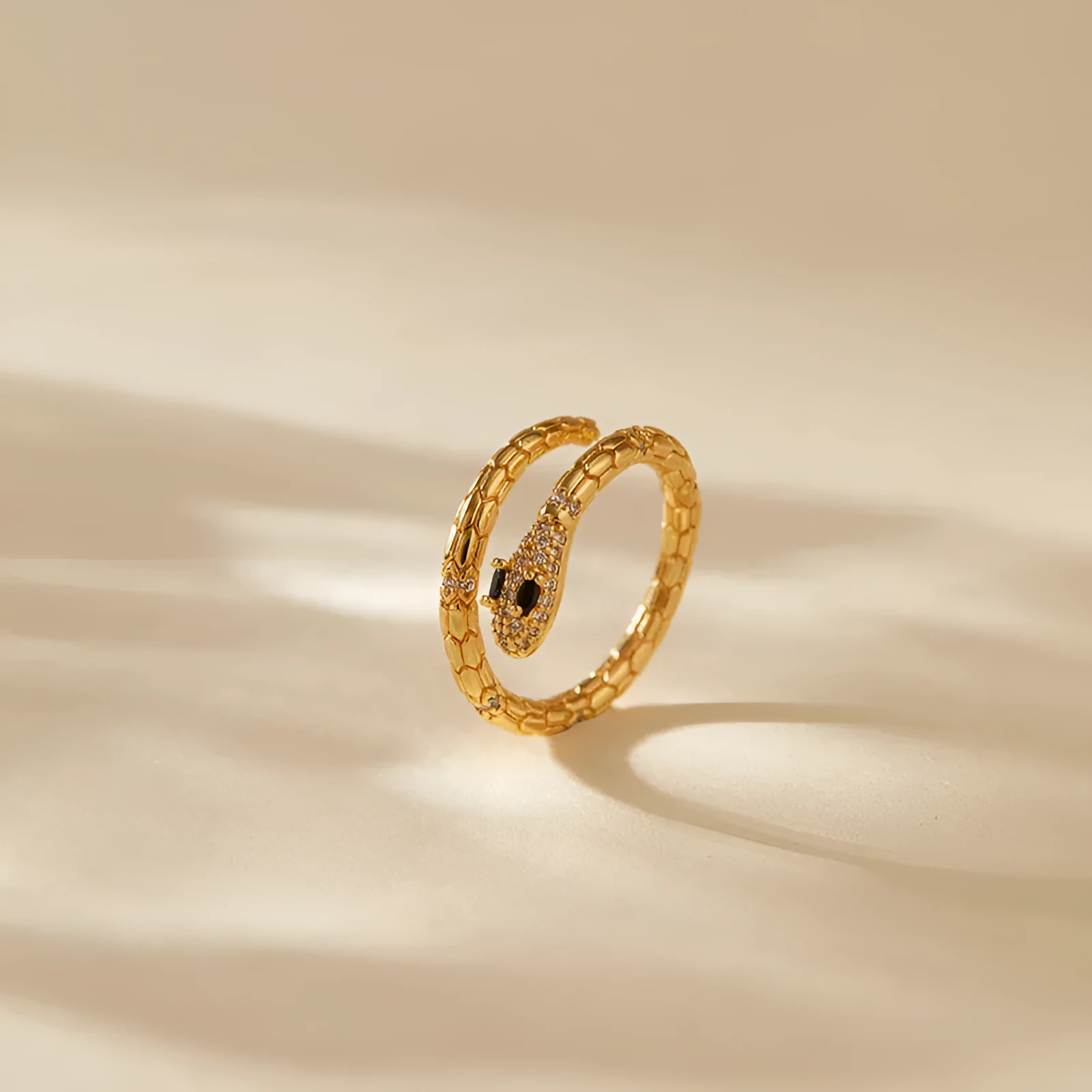 Adjustable copper snake ring with gold colour plating in KR0201.