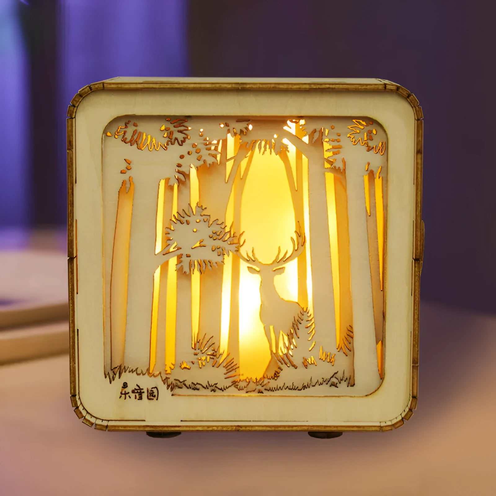 3D wooden puzzle night lamp assembled as a small ornament with train station design on a desk