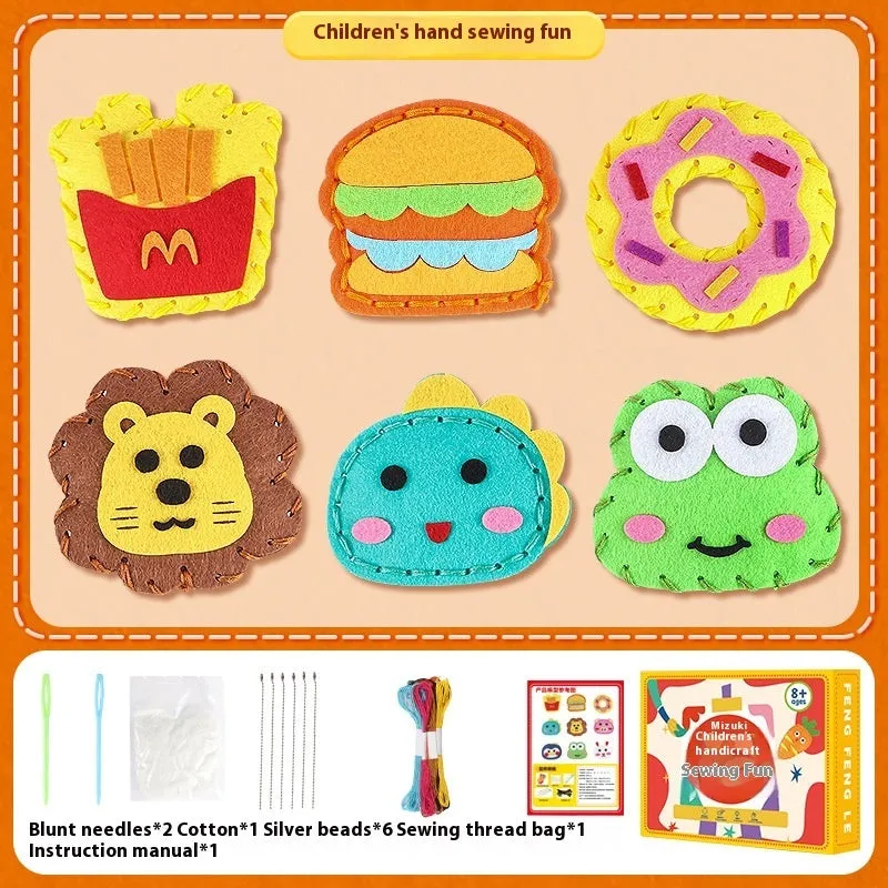 Children's non-woven sewing kit with music theme, cloth pieces, and tools in a colour box measuring 19.5x16x5cm