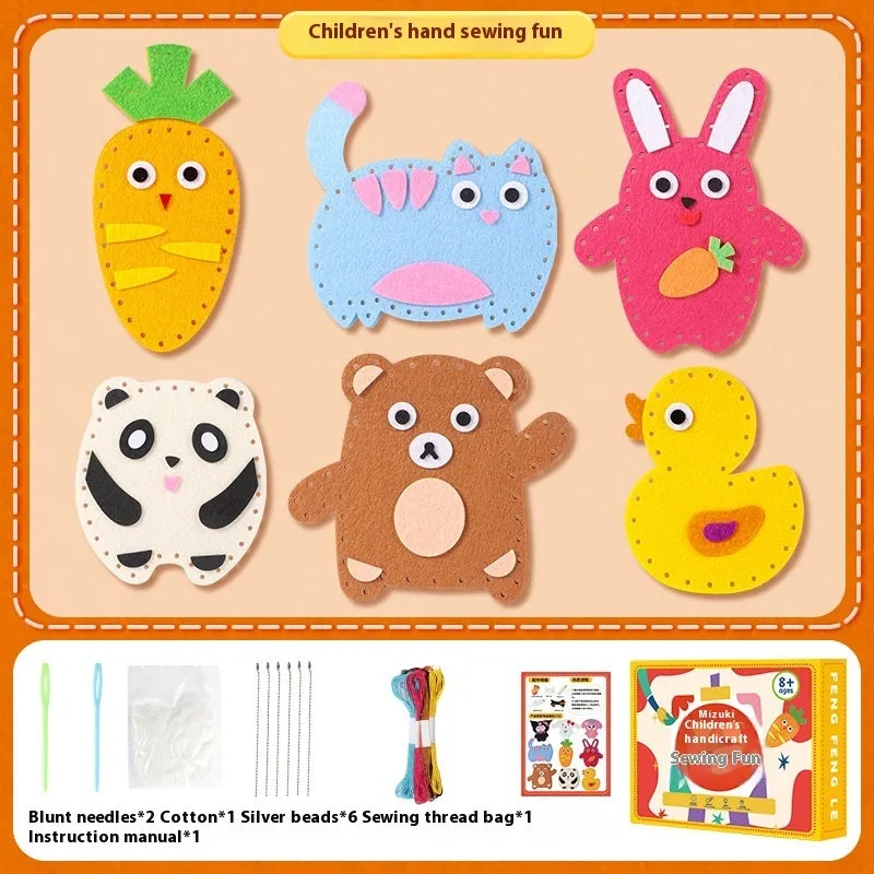 Children's non-woven sewing kit with music theme, cloth pieces, and tools in a colour box measuring 19.5x16x5cm