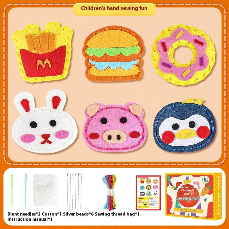 Children's non-woven sewing kit with music theme, cloth pieces, and tools in a colour box measuring 19.5x16x5cm