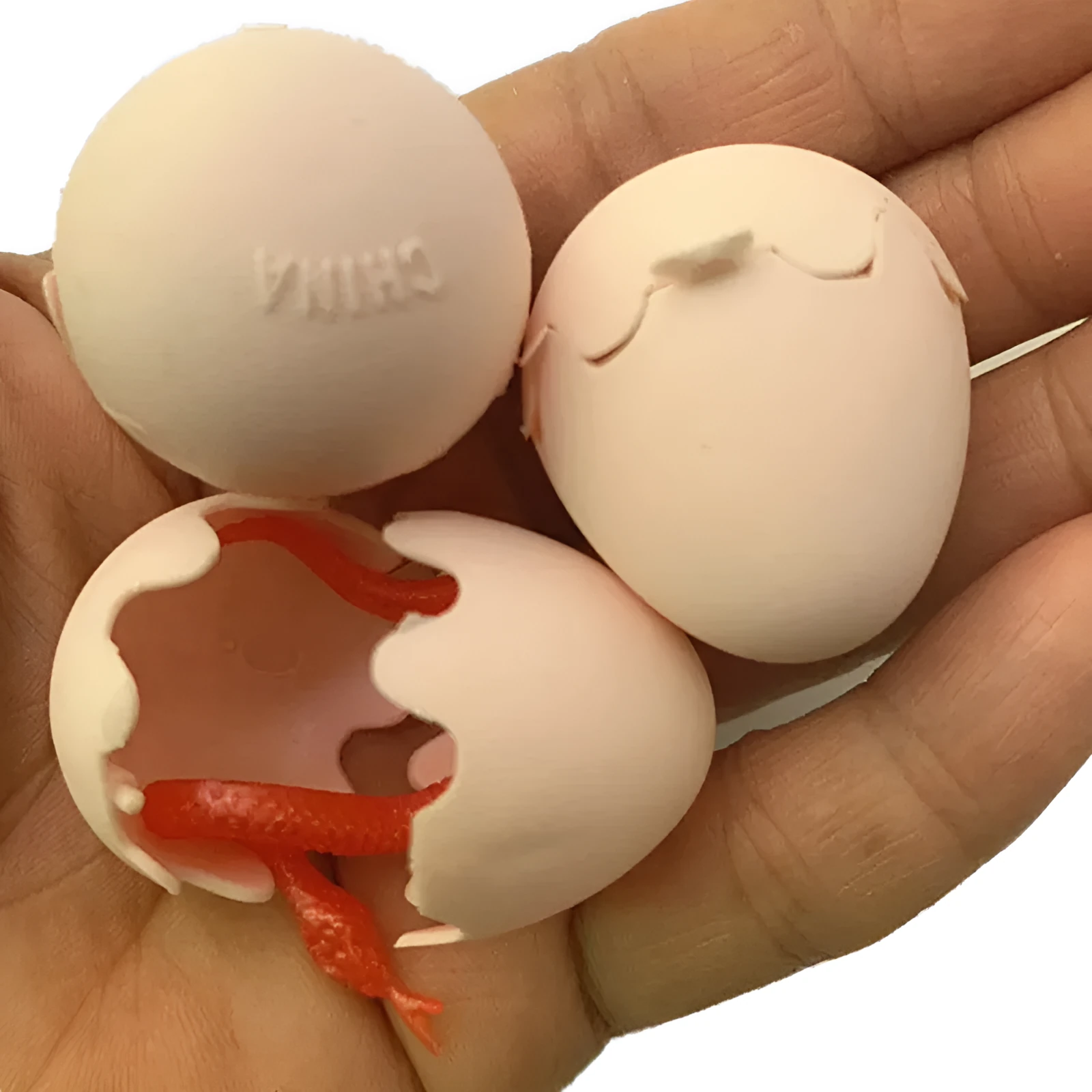 Fake snake egg toy Halloween prank plastic egg 3x3.8cm with stretchable snake 10x1cm