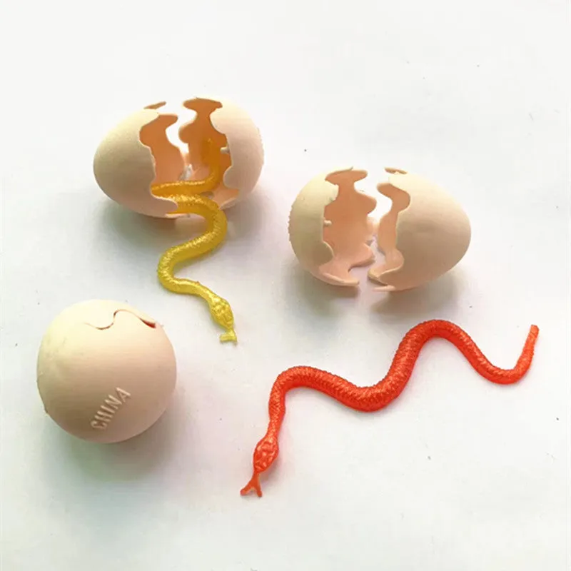 Fake snake egg toy Halloween prank plastic egg 3x3.8cm with stretchable snake 10x1cm