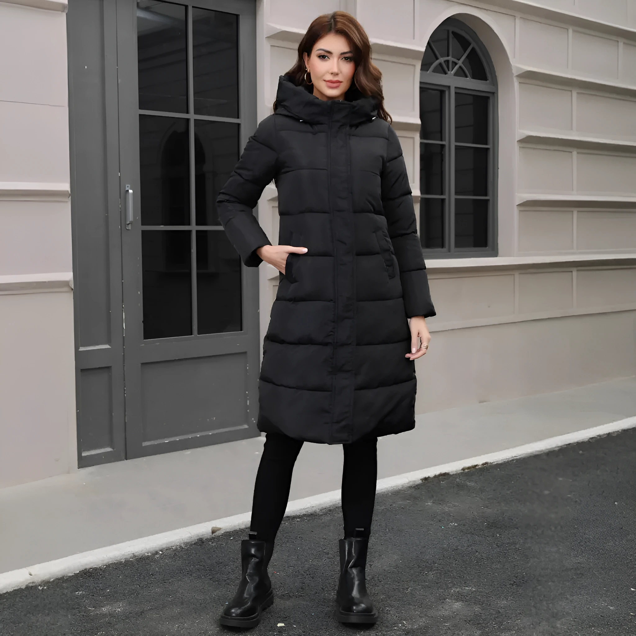 Black slim fit hooded jacket with long sleeves for cold weather protection