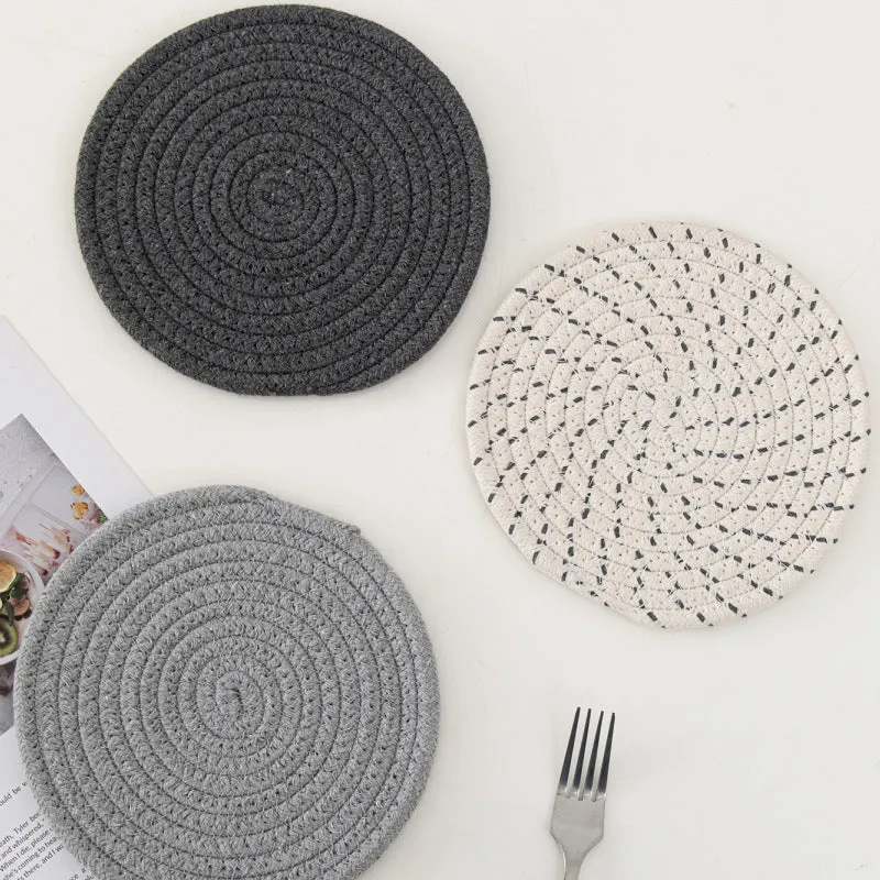 Three round cotton cord coasters in blue colour with modern simplicity design