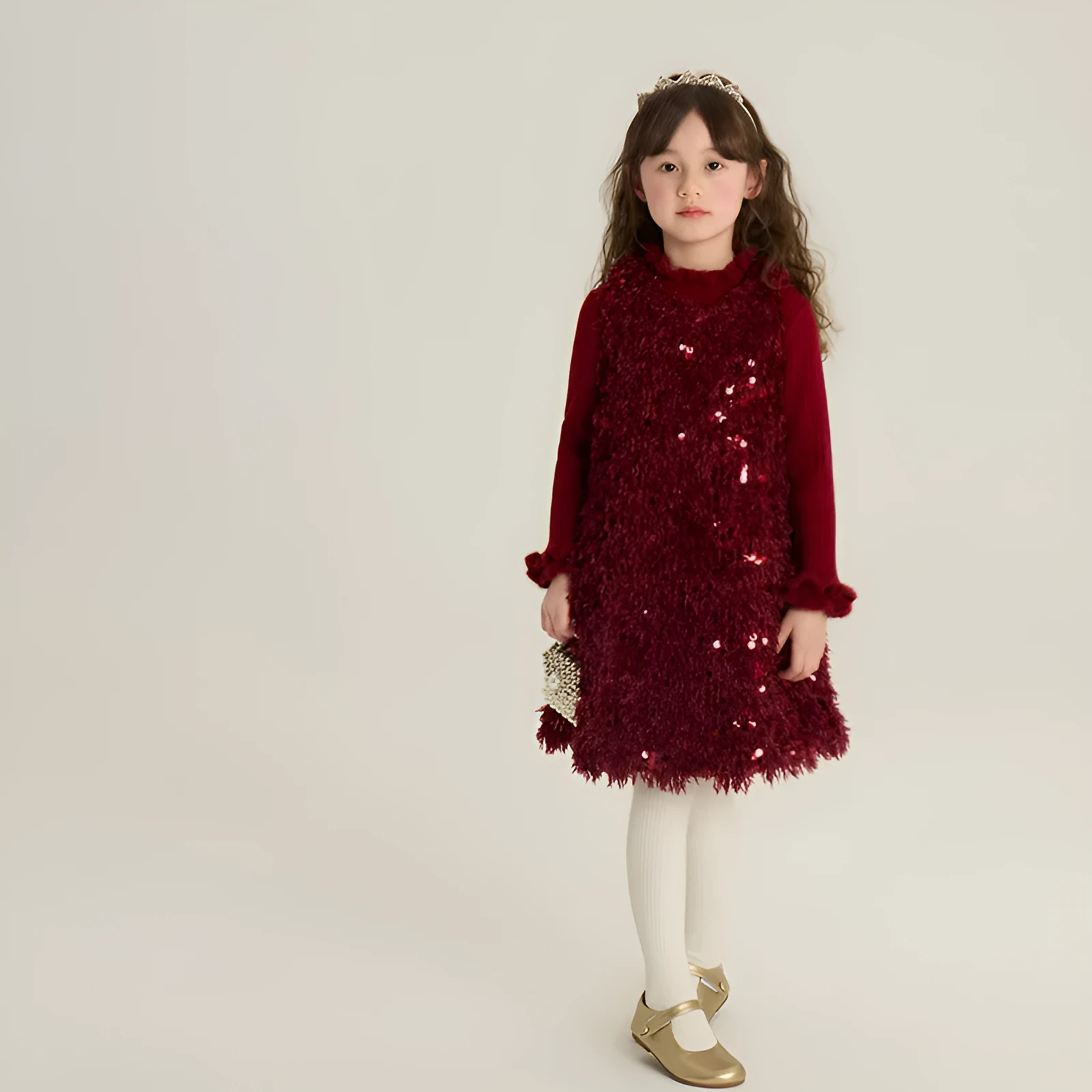 Red winter cotton padded sequin girls vest dress set with matching sweater on child model