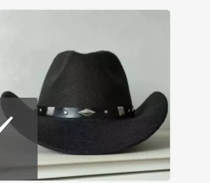 Brown leather velvet cowboy hat with curved brim and conical crown on a wooden post.