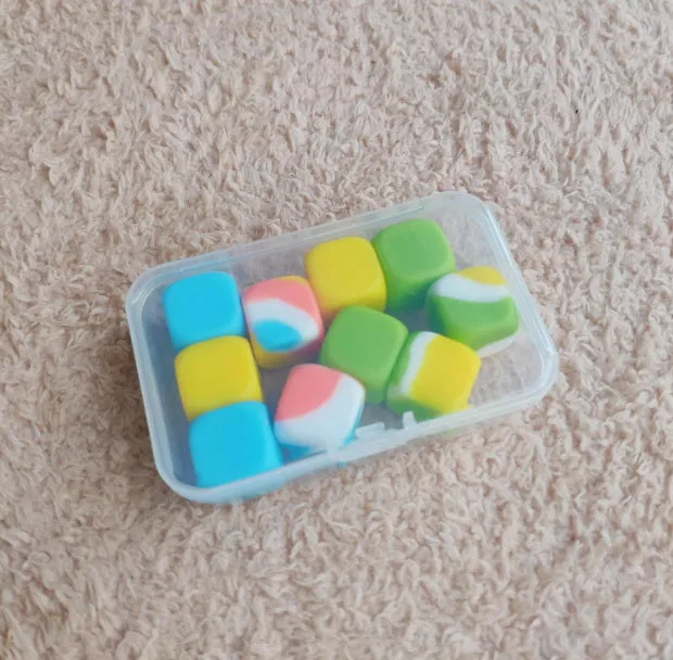 Childhood nostalgic toy claw stone game set with plastic grasping stones in mixed colours