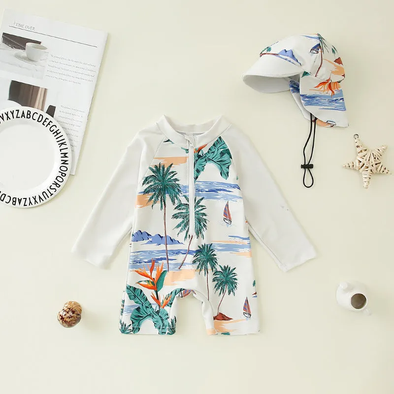 Children's one-piece jumpsuit swimsuit with matching hat in dark blue shark print, made from polyester