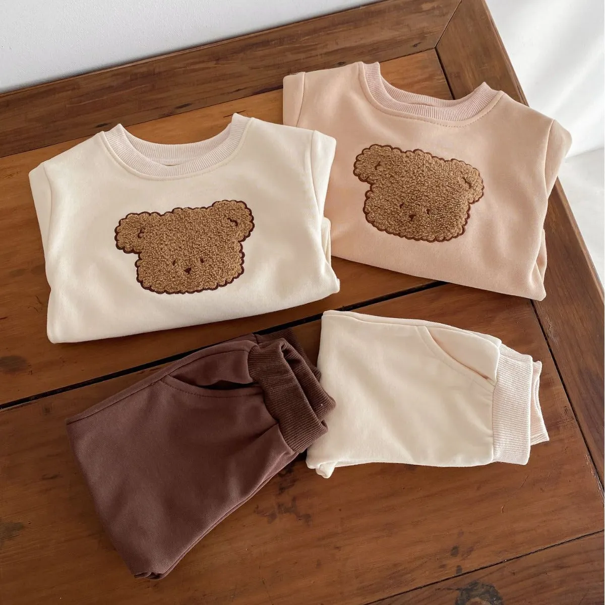 Bear long-sleeved cotton two-piece suit for babies in light beige with cartoon animal print