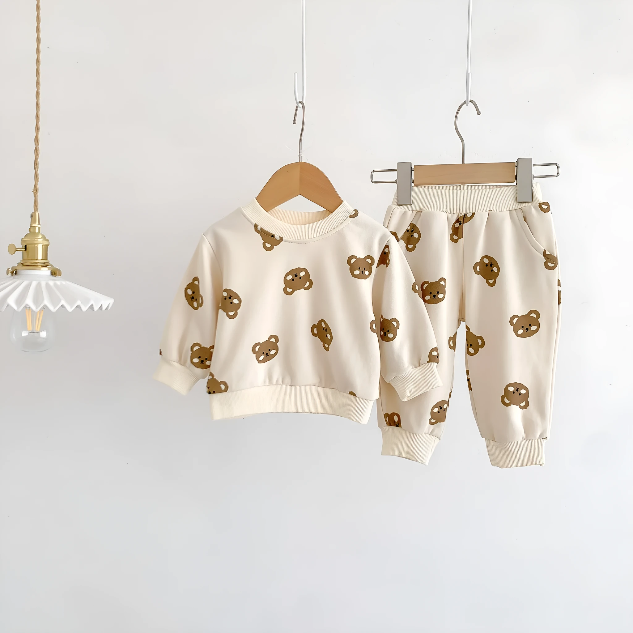 Baby cotton round neck bear cartoon sweater suit in rice apricot with matching trousers