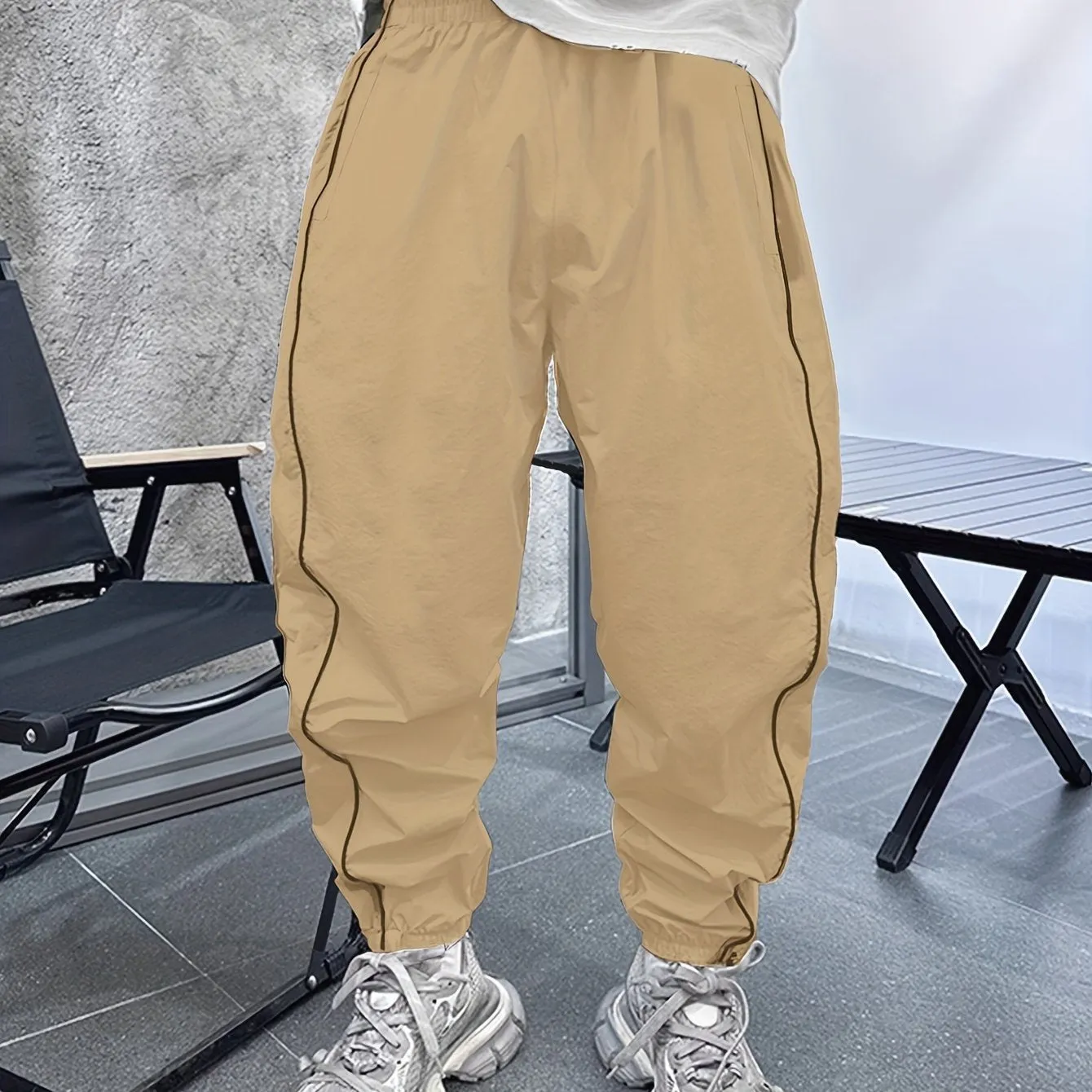 Men's loose fit casual sports trousers in bamboo fibre, shown in cropped length and a colour option like blue.