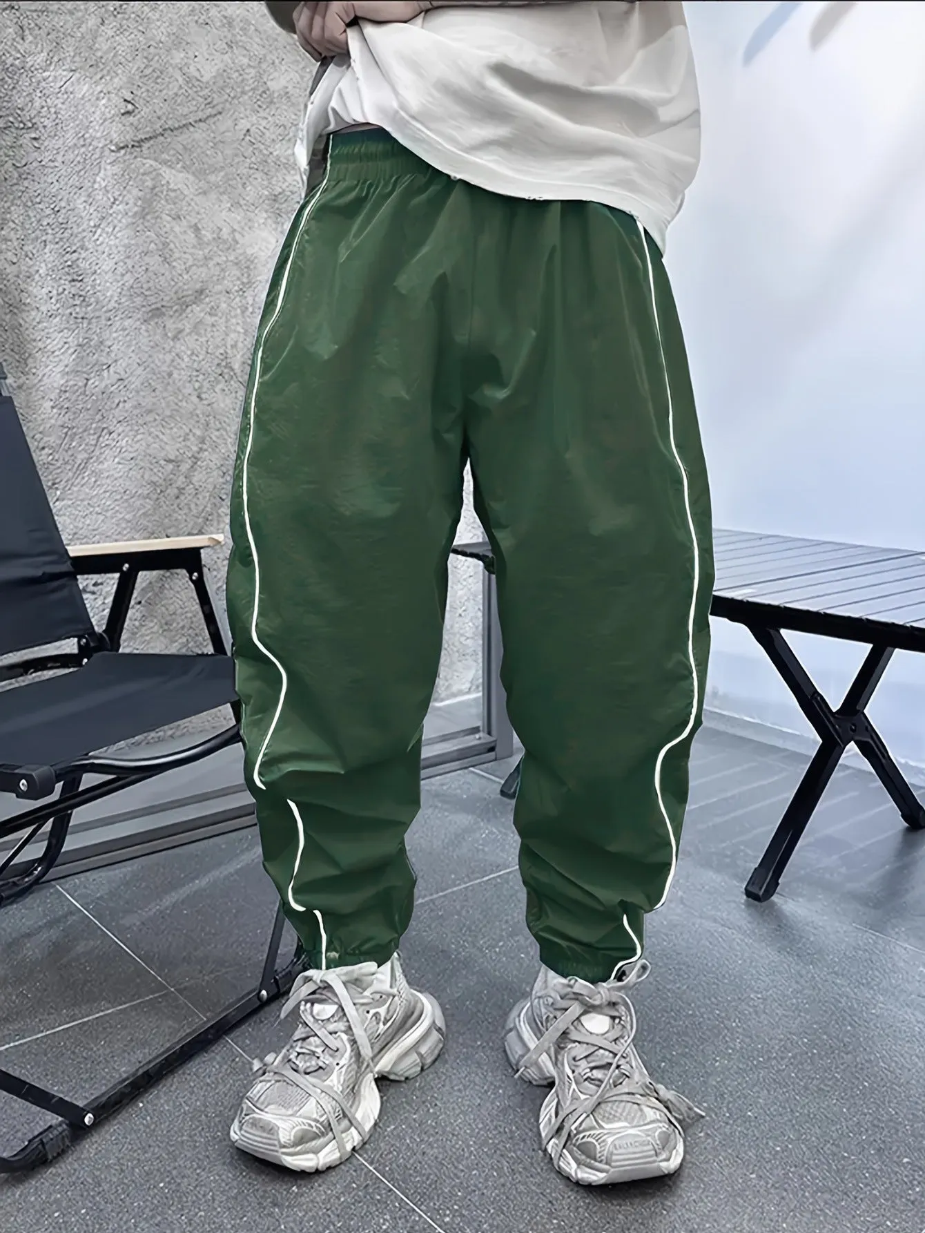 Men's loose fit casual sports trousers in bamboo fibre, shown in cropped length and a colour option like blue.