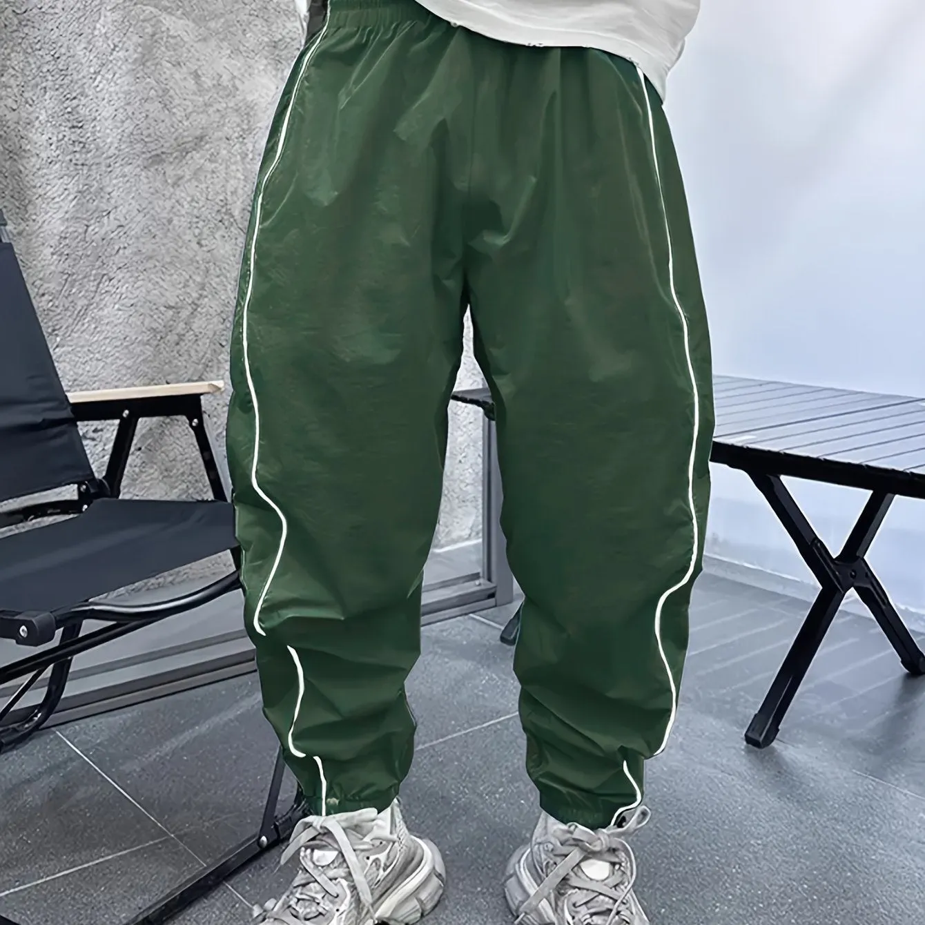 Men's loose fit casual sports trousers in bamboo fibre, shown in cropped length and a colour option like blue.