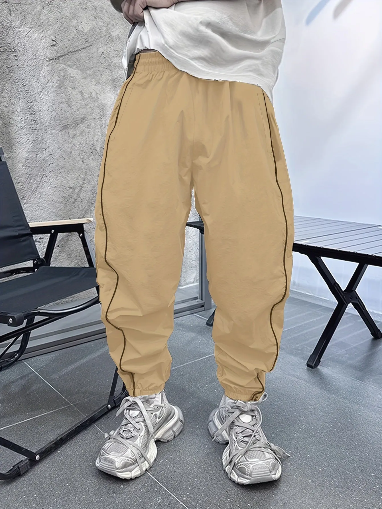 Men's loose fit casual sports trousers in bamboo fibre, shown in cropped length and a colour option like blue.