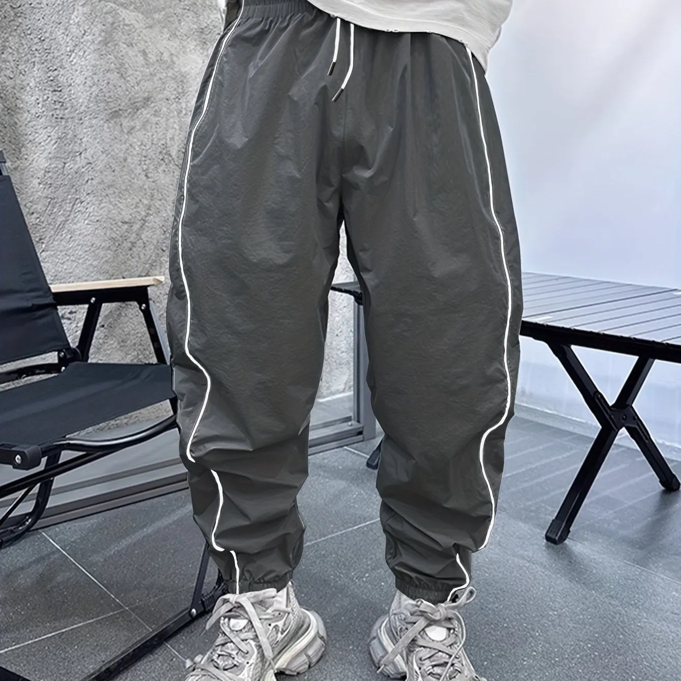 Men's loose fit casual sports trousers in bamboo fibre, shown in cropped length and a colour option like blue.