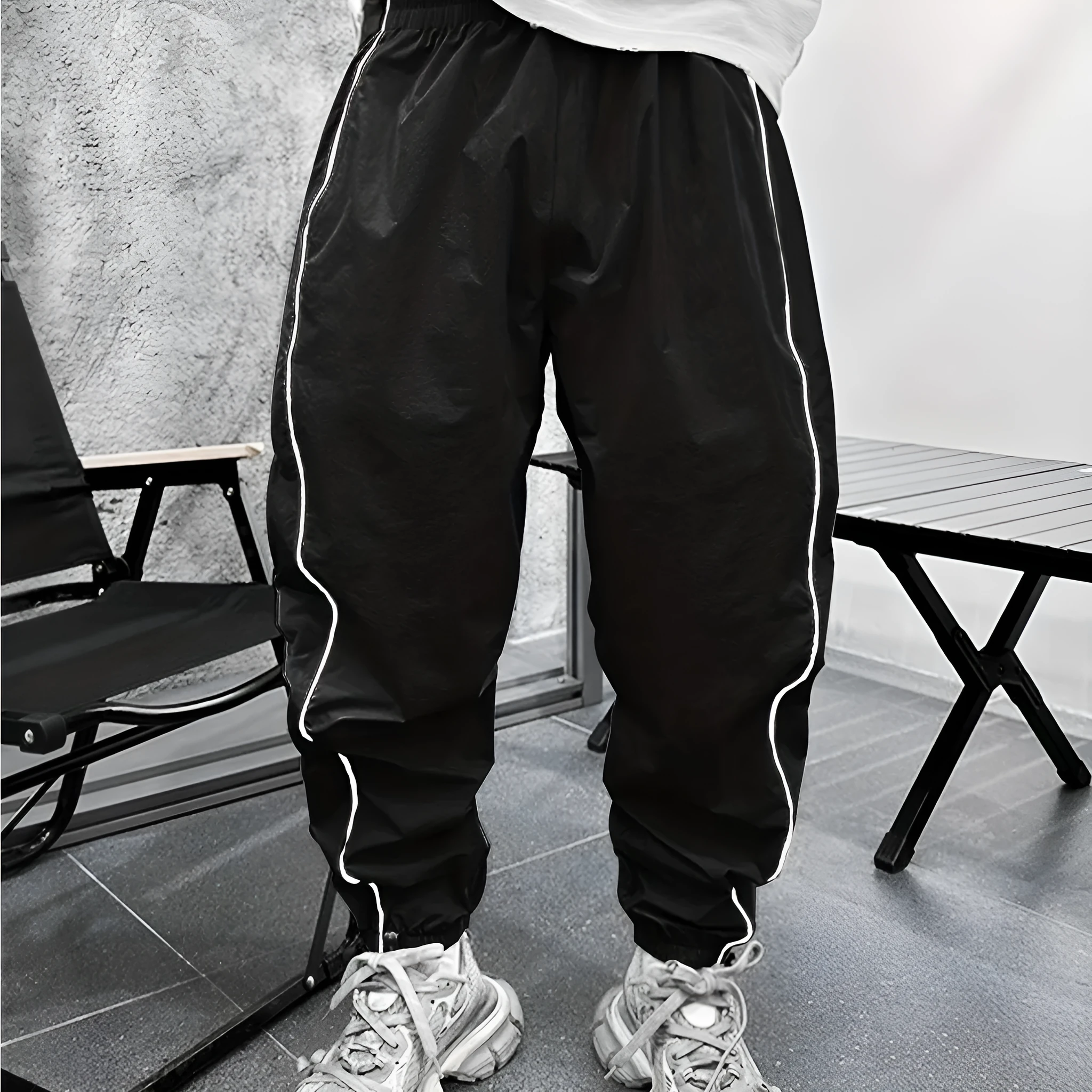 Men's loose fit casual sports trousers in bamboo fibre, shown in cropped length and a colour option like blue.