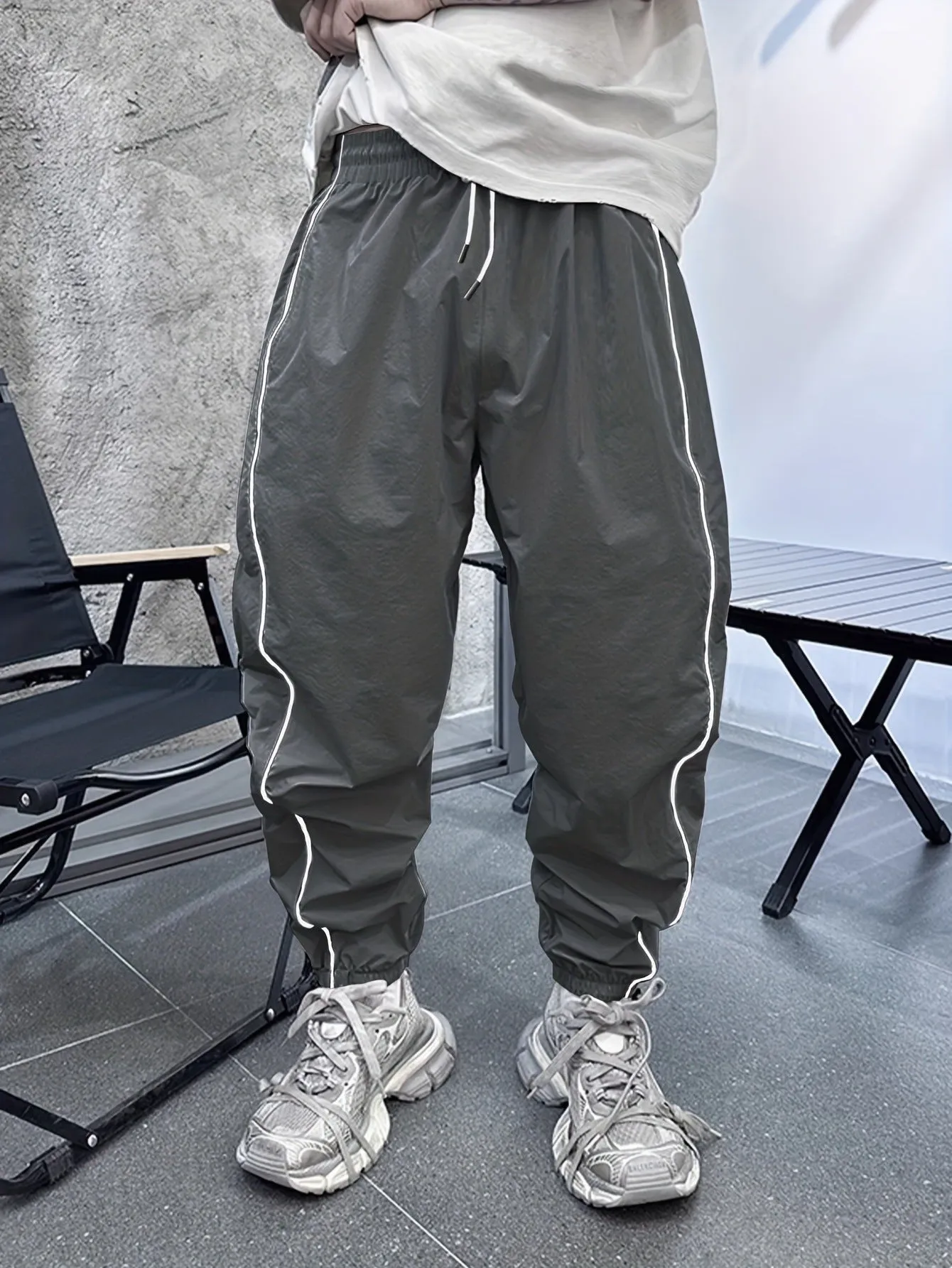 Men's loose fit casual sports trousers in bamboo fibre, shown in cropped length and a colour option like blue.