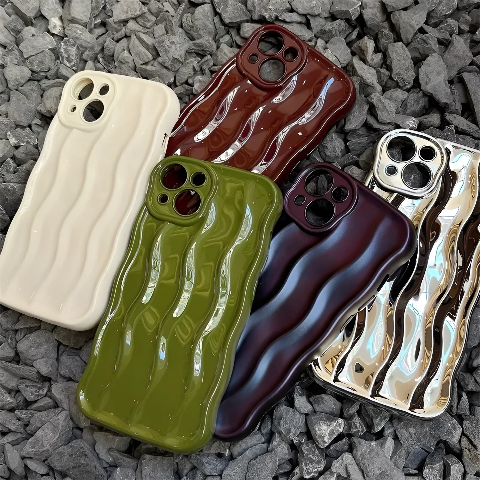 Soft silicone iPhone 17 case with water ripple texture in wavy green colour.