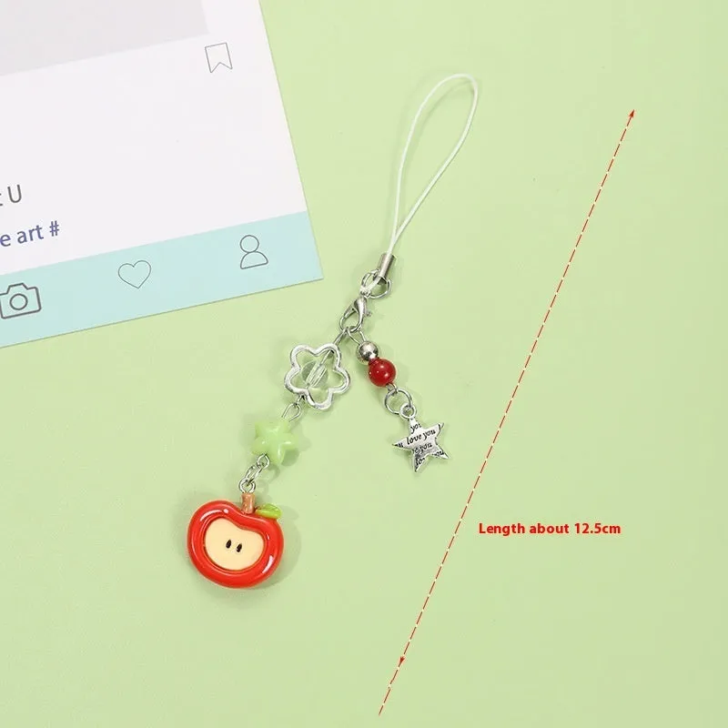 Fruit-themed mobile phone charm keychain with apple and strawberry designs in plastic/resin construction