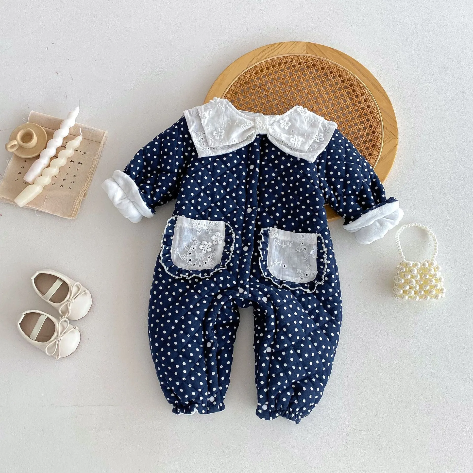 Baby girls winter cotton-padded fleece-lined onesie in dark blue on white background