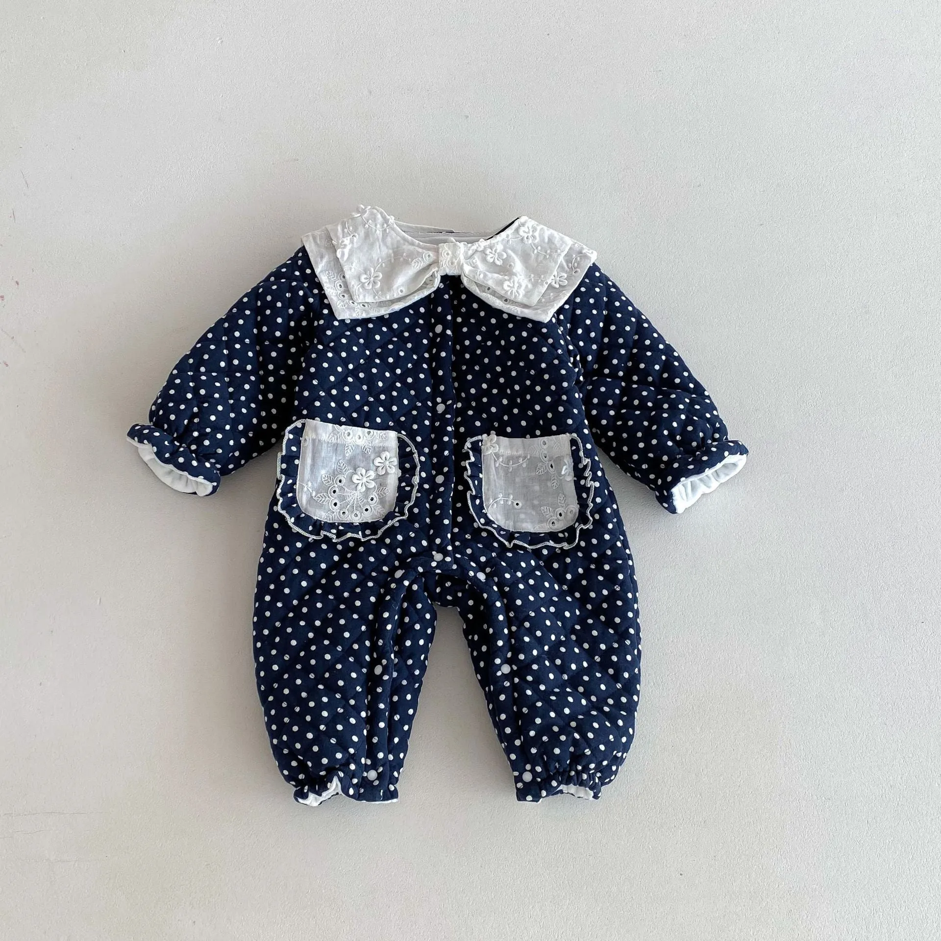 Baby girls winter cotton-padded fleece-lined onesie in dark blue on white background