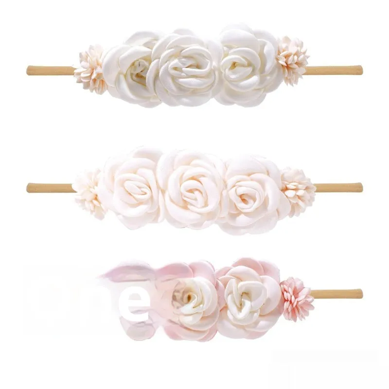 Set of three cloth flower-shaped baby hair bands in different styles