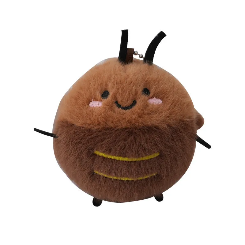Small mink velvet cockroach pendant plush toy doll with black eyes, 8cm height, on a light background