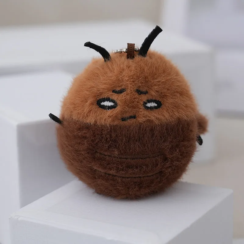 Small mink velvet cockroach pendant plush toy doll with black eyes, 8cm height, on a light background