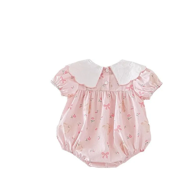 Pink cotton triangle romper jumpsuit for baby girl with three bow details, short sleeves, suitable for height 66-90cm