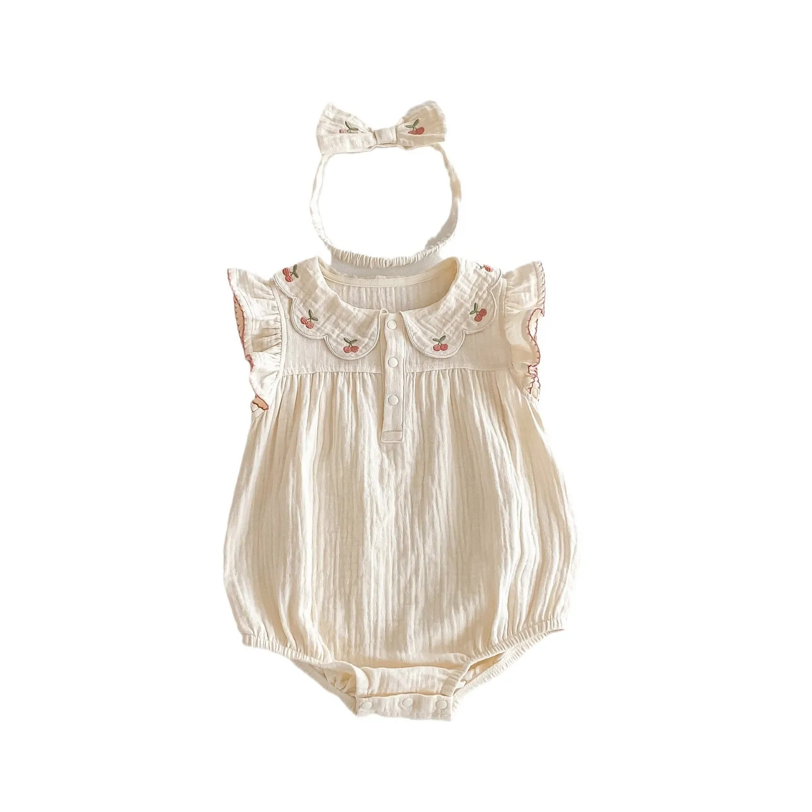 Summer cotton baby jumpsuit in apricot with double-breasted closure and matching hair band