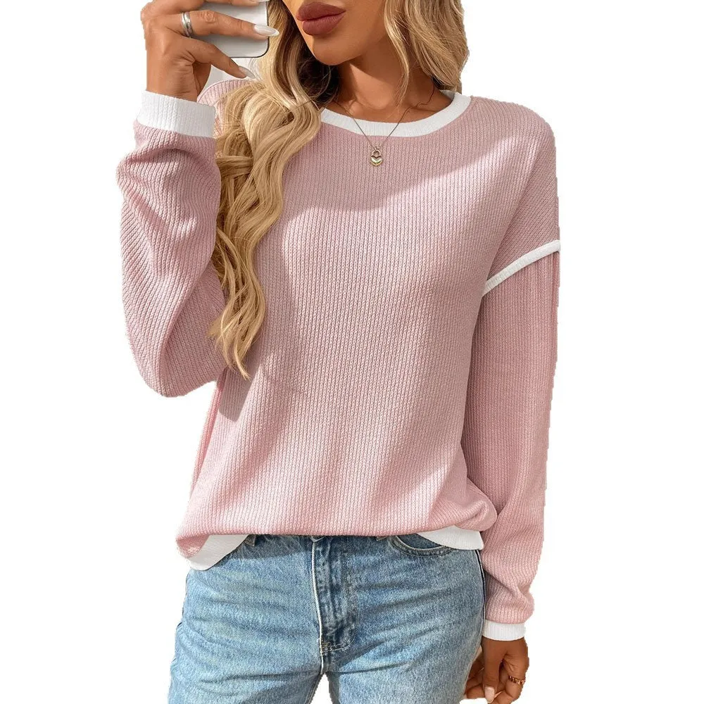 Women's loose-fit long sleeve round neck pullover top in light blue polyester fabric.