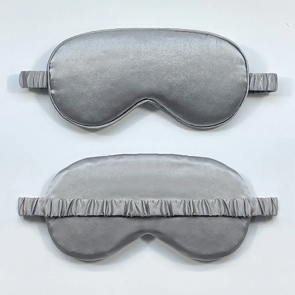 Rayon satin sleep mask in various colours showing double-sided silk-like fabric and elastic strap.